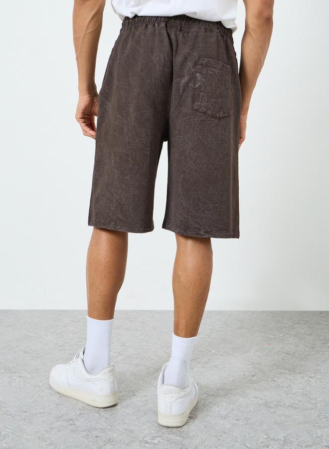 ستايلي شورت بقصة واسعة مع رباط للرجال - Image 4